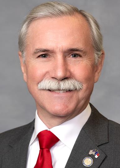 Representative Dennis Riddell